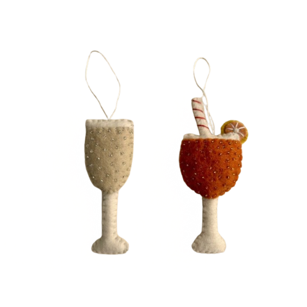 Champagne and Aperol Spritz Christmas decorations featuring beaded champagne glass and festive cocktail ornament.