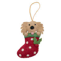 Christmas Golden Retriever in stocking decoration with a cute retriever face peeking out from a festive stocking