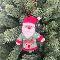 Mr and Mrs Claus in Christmas sweaters - Pashom