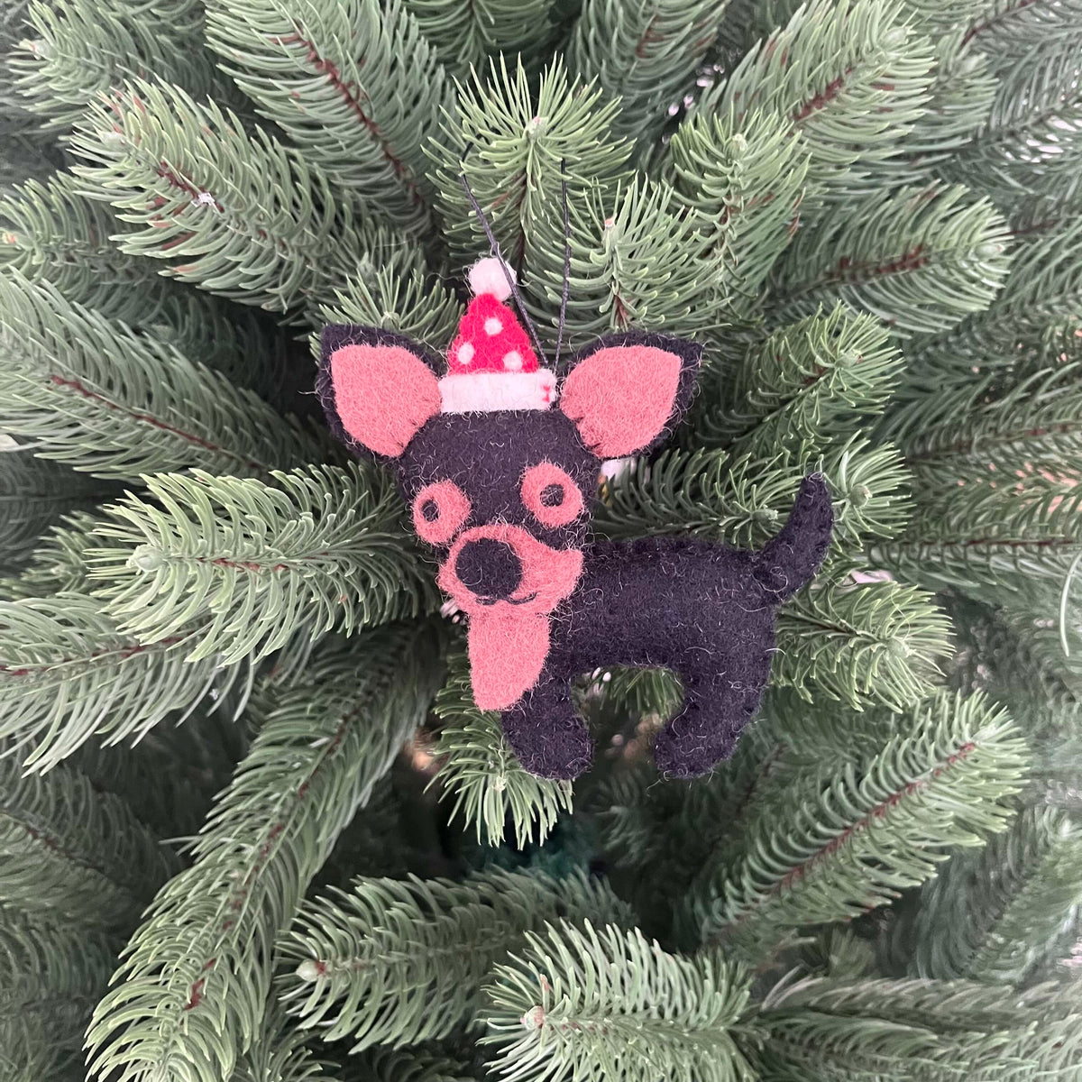 Chihuahua Christmas decoration featuring a cute felt Chihuahua with a Santa hat on a Christmas tree.