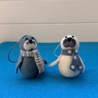 Christmas seals decorations featuring adorable felt seals in scarves for festive holiday cheer.