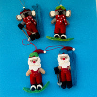 Christmas snowboarding & skiing Koalas decorations featuring adorable koalas and Santa skiing.