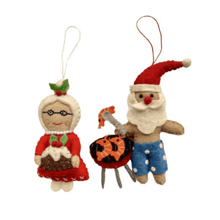 Santa and Mrs Claus with Christmas treats decorations, featuring Santa with a barbecue and Mrs Claus with a Christmas pudding.